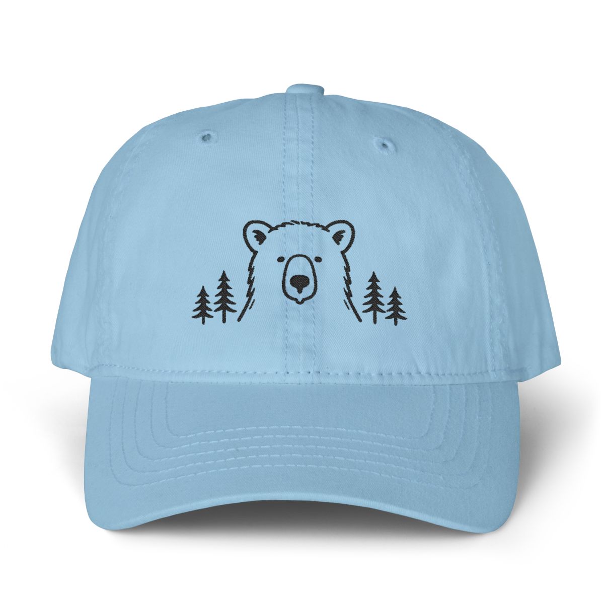 Cashmere blue cotton dad hat with a minimalist black embroidered bear between pine trees